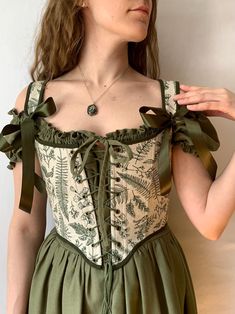 Reversible Botanical Floral overbust corset, green front lacing corset, Renaissance stays, Cosplay costume, Cottagecore corset bodice  ♡ This is a dream! Floral linen and a unique print. You will definitely fall in love with it at first sight and will receive endless compliments! Make your look chic with this stunning corset ♡ Decorated with botanical linen, unique print and dark green cotton on the other side, this accessory offers style and Cottagecore notes in one chic design. With lacing at Vintage Outfits With Corset, Ren Fairy Costume, Corset Aesthetic Outfit, Layering Corset, Fairycore Overbust Corset Dress For Cosplay, Corset With Pants, Woodland Nymph Costume, Fairycore Fitted Corset For Costume, Milkmaid Costume