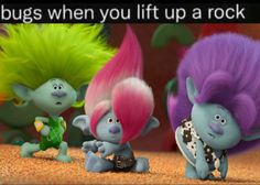 three cartoon characters with different colored hair standing next to each other