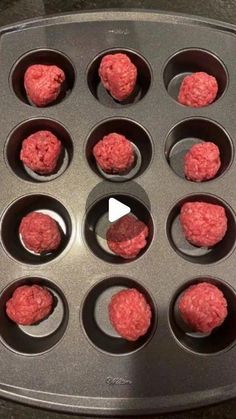 the hamburger patties are ready to be cooked in the muffin tins on the stove