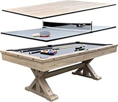 two tables with pool balls and cues on them, one in front of the other