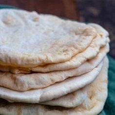 three pita breads stacked on top of each other