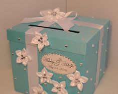 a blue box with white flowers on it