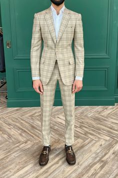 Man in a beige check mens suit