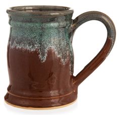 a brown and green coffee mug on a white background with the handle slightly bent down