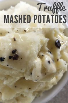 mashed potatoes in a white bowl with chocolate chips on top and text overlay that reads truffle mashed potatoes