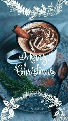 a cup of hot chocolate with cinnamon on top and the words merry christmas written in white