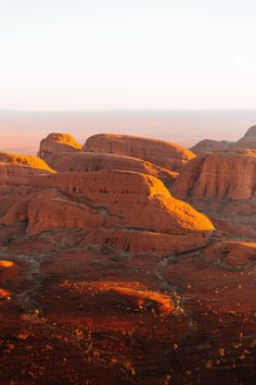 the desert is covered in yellow and red rocks