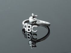 Sterling Silver ABC with Apple ring 7mm apple with 11mm x 5mm ABC Sizes available: 5, 6, 7, 8 and 9 Best Teacher Gift, Teacher Graduation Gifts, Teacher Jewelry, Teacher Graduation, Apple Rings, Graduating Teacher, Best Teacher Gifts, School Teacher Gifts, Pinky Ring