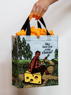 The devil went down to Wisconsin, and brought you some cheddah. 95% post consumer recycled material. 8.5"w X 10"h X 4.5"d Reusable Lunch Bags, Weird Gifts, Blue Q, Crazy Stuff, People Clothes, Eco Friendly Bags, Food Board, Mini Tote, Have You Tried