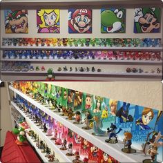 the shelves are full of mario and luigi figurines