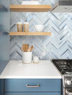 the kitchen counter is clean and ready to be used as a storage area for cooking utensils