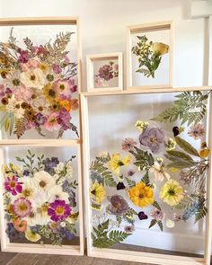 three framed pictures with flowers on them