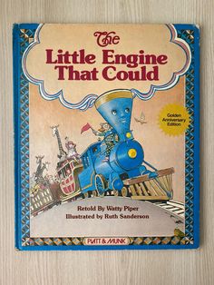 the little engine that could book sitting on a table