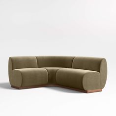 the curved couch is made out of fabric