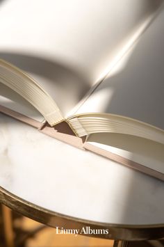 an open book sitting on top of a table