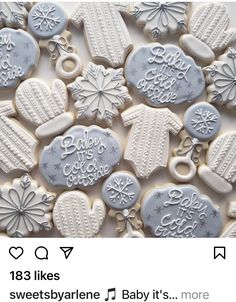 decorated cookies are arranged in the shape of snowflakes and mittens with words on them