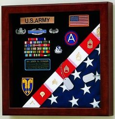 an american flag and medal display in a wooden frame with the words u s army on it