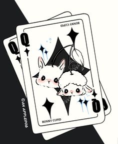 two cards that have animals on them, one is white and the other is black