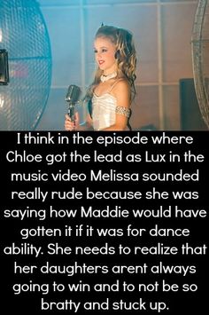 a girl in a white dress holding a microphone and standing next to a fan with the words, i think in the episode where choice got the leads