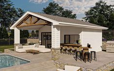 an outdoor living area next to a swimming pool and covered patio with bar seating on the side