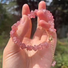 "Strawberry Quartz Chip Bracelet. Strawberry Quartz chip bracelet with gold accent lobster clasp. This beautiful bracelet has a pink color with red speckles. This bracelet is adjustable and would also make a great anklet. ♡♡ Makes a Beautiful Gift ♡♡ Strawberry Quartz: Gentleness, Serenity and Harmony * Strawberry Quartz Chips * Internal Metal Wires * Gold Lobster Clasp  ♡ View the store here: usagimarshmellow.etsy.com ♡ Follow on instagram: instagram.com/usagimarshmellow L E N G T H This is a adjustable bracelet so it will fit most wrists. Please message me if you have any concerns or want some extra help ♡ G I F T I N G & P A C K A G I N G Your bracelet will be packaged in a jewelry gift box or cotton to protect it during travel. Multiple items may be packed in one gift box.  Additionall Strawberry Quartz Bracelet, Bracelet Packing Ideas, Gold And Pink Jewelry, Cute Handmade Bracelets, Pink Quartz Jewelry, Pink Quartz Bracelet, Pink Crystal Bracelet, Pink Gold Jewelry, Chip Bracelet