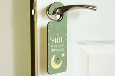 a door handle with a quote on it that says shh little one is dreaming