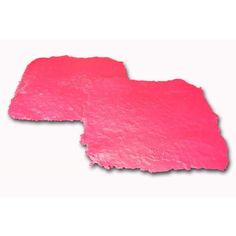 two pieces of pink paint on white background