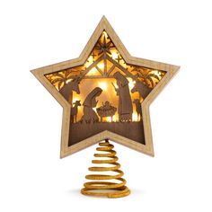 a lighted nativity scene in the shape of a star