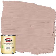 a pink paint can with the lid open and it's base painted in beige