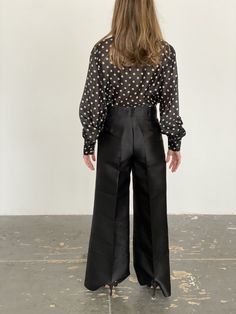 "Oscar de la Renta gorgeous black silk wide leg pants. Pleated line down the middle, high waisted and no pockets for a slim hip line. A thick structured silk, these pants are perfect for black tie outfit. Waist 28\" Rise 10.5\" Inseam 30\" Hips 40\" Leg opening 13\" Fit a S or M" Black Silk Wide-leg Pants, Black Silk Wide Leg Bottoms, Satin Pants For Evening, Satin Straight Pants For Evening, Evening Satin Straight Pants, Evening Straight Satin Pants, Chic Black Semi-formal Pants, Chic High Waist Silk Wide Leg Pants, Chic High-waist Wide Leg Silk Pants