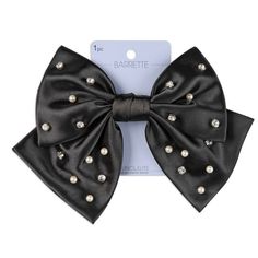 Make a statement that will get noticed…and complimented…when you clip in this bow barrette. The bow is perfectly pre-tied. Clip it in place and it looks stunning every time. Wear it with a high ponytail or pull side sections of hair back for a sophisticated look that keeps hair away from your face. About scünci hair accessories: When it comes to keeping your look on-trend, scünci has you covered with today’s hottest hair accessories, including stylish headbands, super-comfy scrunchies, glitzy bo Bow Barrette, Stylish Headbands, High Ponytail, Hair Back, Elastic Hair Ties, High Ponytails, Hair Elastics, Barrette Clip, Hair Tools