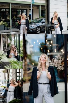 a woman in white pants and black blazer talking on her cell phone while walking down the street