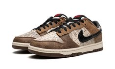 The Nike Dunk Low Co. Jp “Brown Snakeskin” is a bold colorway of the retro basketball shoe from Nike’s resurrected “Co. Jp” line.  Nike’s “Concept Japan” collection originally launched in Japan in the early 2000s, and styles like this “Brown Snakeskin” mark its return in 2023.  This Dunk Low features a can’t-miss design with cream-based snakeskin patterning on the base.  Contrasting brown suede overlays with a subtle snakeskin print appear on the toe, forefoot, eyelets, and heel.  A black leathe Nike Dunk Low Snakeskin, Dark Driftwood Nike, Snakeskin Shoes, Dunk Low Nike, Snake Skin Shoes, Retro Basketball Shoes, Retro Basketball, Limited Edition Sneakers, Natural Shades