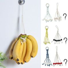 several bananas hanging from hooks on the wall