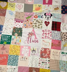 a quilt made up of many different types of patches and hearts with the name minnie on it