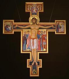 the crucifix is painted with many different colors