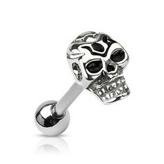 a silver skull piercing ring with black stones