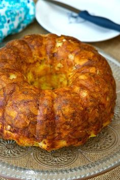 a bundt cake sitting on top of a glass plate