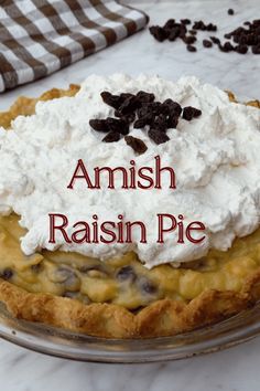 an amish raisin pie with whipped cream on top