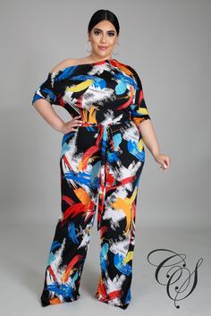 Add some fresh prints to your look with this jumpsuit. Featuring an abstract print, stretchy fabric, boat neckline, midi sleeves, wide bottoms, self tie waist belt, no closures. We are totally obsessed. Team this with a pair of mules and complete the look with a mini bag. Model is wearing a 2X Fabric: 95% Polyester 5% Spandex Hand wash cold, line dry. Do not bleach, iron or dry clean. Size Chart *Restock Notice: Garcelle Abstract Print One Shoulder Jumpsuit will restock Wednesday July 14, 2021 African Jumpsuits For Women Plus Size, Jumpsuits For Women Plus Size, African Jumpsuits For Women, Jumpsuit Designs, Celebrity Inspired Dresses, Jumpsuit Outfits, Stretch Jumpsuit, Organza Sleeves, One Shoulder Jumpsuit