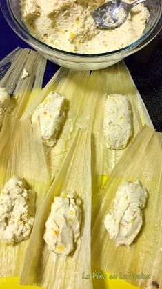 corn on the cob with butter and other ingredients in a bowl next to it