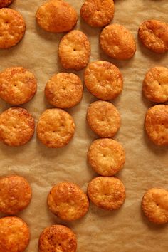 some fried food is laying on a piece of parchment paper and ready to be cooked