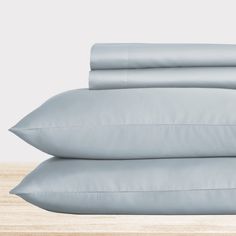 three pillows stacked on top of each other