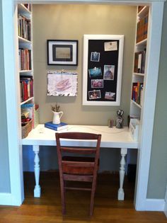 a desk and chair in a small room