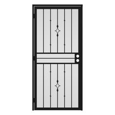 an iron door with glass panels and wrought bars on the top, in front of a white background