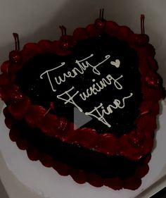 there is a heart shaped cake on the table with writing on it that reads twenty five years first