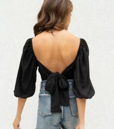 Turning Heads Ruched Bust Top – Mota Boutique Chic Party Tops With Bow Tie Back, Bow Tie Back Tops For Night Out In Spring, Spring Bow Tie Back Tops For Night Out, Fitted Tops With Smocked Back For Date Night, Chic Tops With Bow Tie Back For Night Out, Fitted Tie Back Blouse For Day Out, Smocked Back Crop Top For Brunch, Fitted Tie-back Blouse For Day Out, Elegant Backless Top With Tie Back