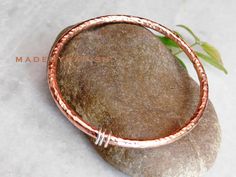 hammered copper bangle | Copper stacking bangle | Pure copper jewellery | Copper Bracelet for Women Arthritis | Gift for her | Gift for dad, Metal - Pure Copper Choose  bracelet length from 6 to 10 inches Handmade Copper bangle THICKNESS 4 mm NOTE- Copper is helpful for balance, communication, and synchronicity. Copper is a great conductor of energy and is useful for all types of spiritual purposes. Many use Copper to balance the Chakras and Meridians. Powerful wands can be fashioned using crystals and Copper tubing or wire. Connecting with the crystals, Copper can smoothly transmit their energies to the holder, communicating knowledge from higher realms to the conscious and subconscious mind. Copper is a popular tool for healing and works with all of the Chakras to pull in energies from h Hammered Rose Gold Bangle, Handmade Copper Bracelet, Copper Jewellery, Les Chakras, Copper Tubing, Stacked Bangles, Copper Bracelet, Handmade Copper, Pure Copper