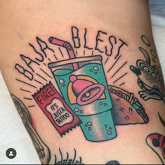 a tattoo with an image of a drink and some snacks