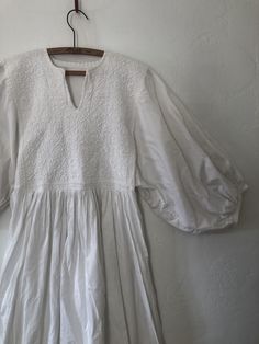 Vintage Mexican wedding dress. Thick cotton full length dress. Embroidered flower details at chest, hem, and sleeves. Size:  Up to women's L length 60" Pit to pit: free Waist up to 31" No tag In great vintage condition. Vintage Mexican Wedding, Mexican Wedding Dress, Mexican Wedding, Full Length Dress, Caftan Dress, Vintage Mexican, Embroidered Flowers, White Vintage, White Cotton